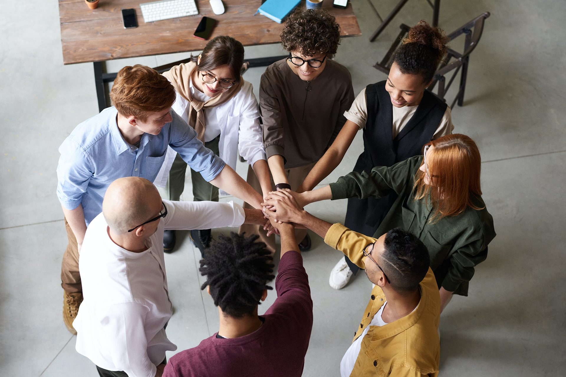 a group of people giving hi five